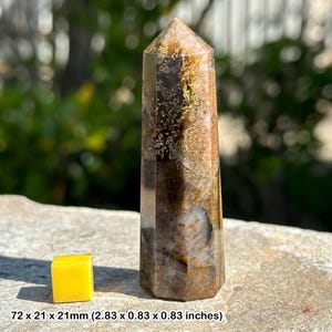 Tiger eye obelisk point for protection and courage
