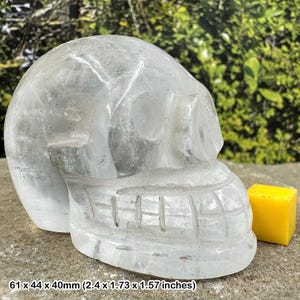 Genuine handcrafted crystal rock skull - spiritual healing mineral stone for unique energy and presence