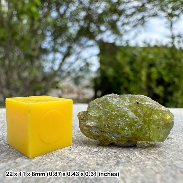 Genuine peridot rough crystal: raw olivine gemstone