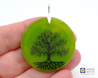 Tree of Life pendant on round green fused glass, handmade in the UK with sterling silver bail