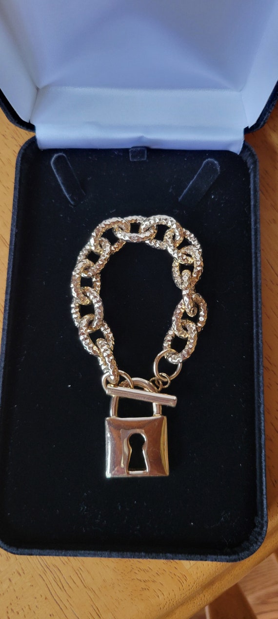 gold plated chain link and lock bracelet
