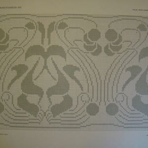 May include: A page from a book featuring a detailed, grayscale pattern. The design includes stylized floral and geometric elements, with curved lines and repeating motifs. The text at the top reads "WIENER KUNSTGEWERBE 1911" and "JUGEND STIL SCHOLARLY WORK".