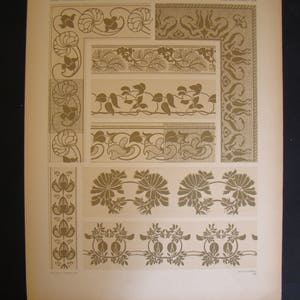 May include: An antique print featuring various Art Nouveau-style border designs. The borders showcase floral and organic motifs in shades of gold and brown, arranged in rectangular and vertical formats.