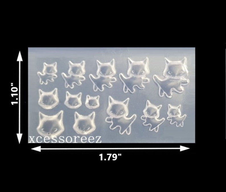 Puede incluir: Molde de silicona transparente con 12 cavidades en forma de gato. El molde mide 1,79 pulgadas de ancho y 1,10 pulgadas de alto. El molde est&aacute; dise&ntilde;ado para hacer manualidades de resina.