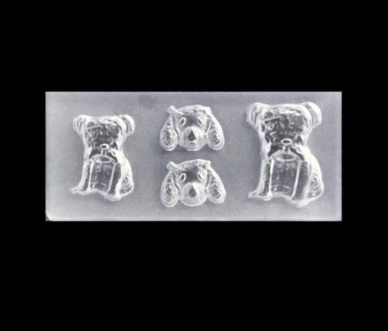 Puede incluir: Molde de silicona transparente con cuatro cavidades en forma de perro. El molde est&aacute; dise&ntilde;ado para crear peque&ntilde;as decoraciones con forma de perro.
