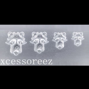 Puede incluir: Un molde de silicona transparente con cuatro dise&ntilde;os de cara de mapache de diferentes tama&ntilde;os. El molde es para hacer manualidades de resina.