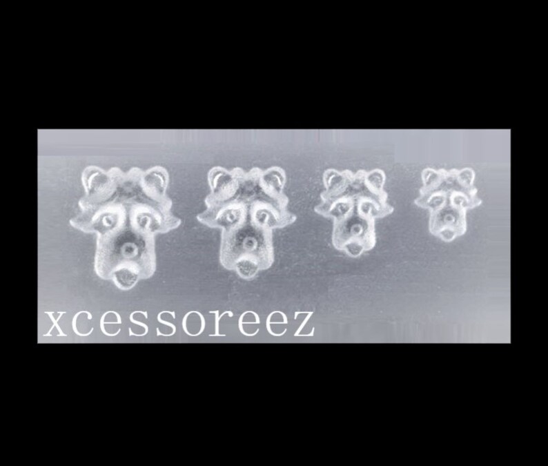 Puede incluir: Un molde de silicona transparente con cuatro dise&ntilde;os de cara de mapache de diferentes tama&ntilde;os. El molde es para hacer manualidades de resina.