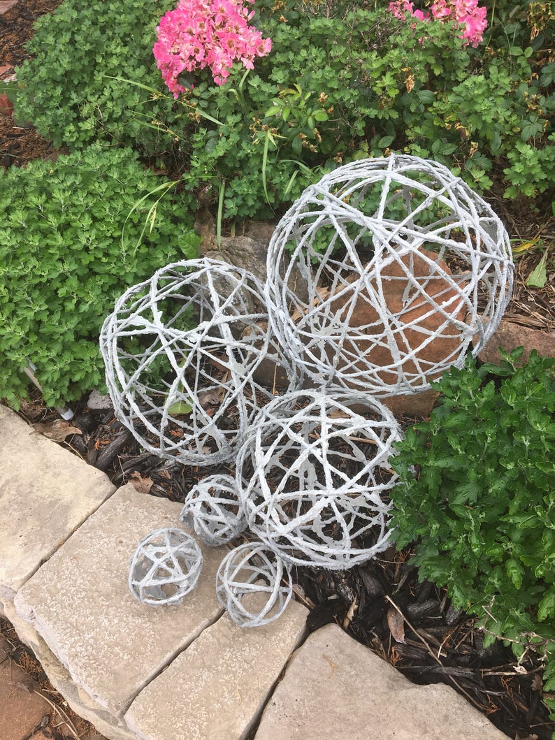 Concrete orb garden spheres. image 1