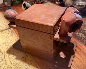 Vintage pipe holder.