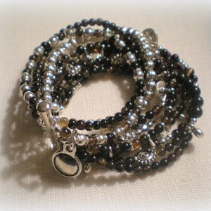 MULTI STRAND BRACELET ... black and silver