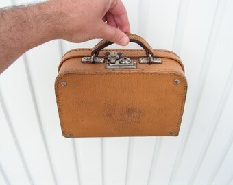 small cardboard suitcases