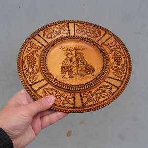 lovely wooden plate Carved wood plate with man woman folk costumes Vintage Hand pyrography plate Wood folk art
