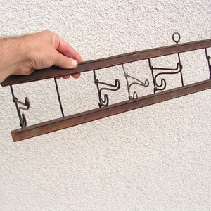 Antique folding wall hanger Wood metal coat rack Vintage wall hanger Rustic wall racks Old peg rack Wall folding hooks