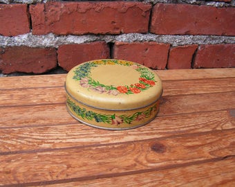 Tin round box Vintage tea box Collectible metal box Flower box Old box floral motifs Painted box Yellow metal box