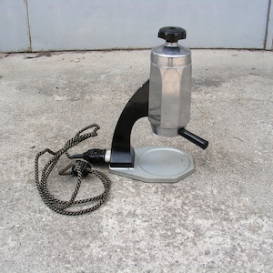 Vintage coffee machine Working electric coffee machine Primitive simplified machine Travel massive coffee maker Camping heavy coffee maker