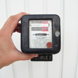 Vintage black electrometer Double heavy massive electrometer Electric measuring instrument Electricity meter 220V
