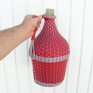 Vintage demijohn 1960s Hand wicker bottle Hand-knitted wicker bottle Big wine bottle Wrapped bottle plastic stopper