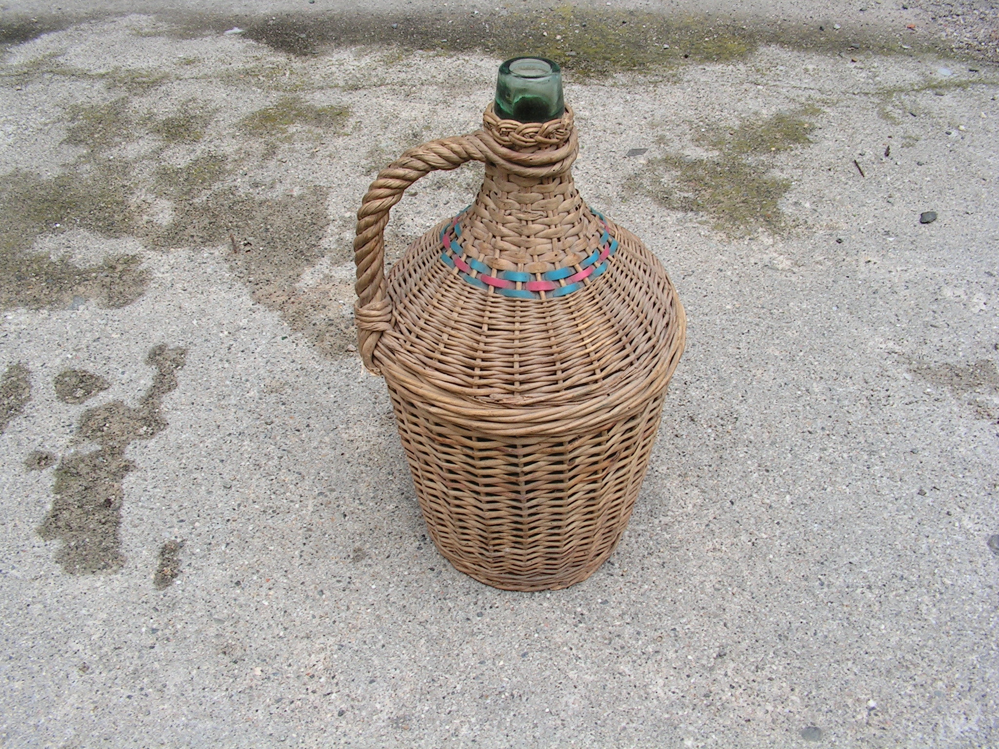 Vintage demijohn with threads Hand wicker whiskey bottle with colored plastic strips Big Hand-knitted wicker bottle Wrapped rustic bottle