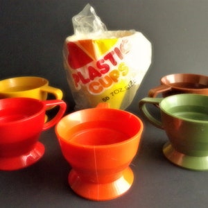 Vintage 3 Green and 1 red plastic solo cozy cups Solo Cup Company