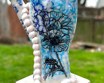Mano de bruja del jardín azul
