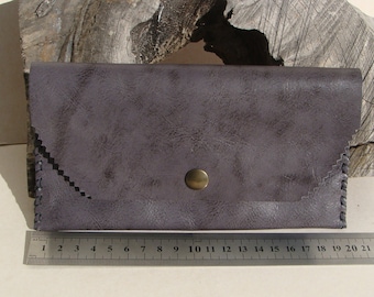 handcrafted cases in fancy leather, zipped pocket