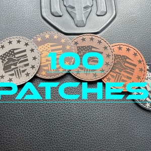 May include: A collection of round patches in various shades of brown and gray, each featuring an American flag design with stars and stripes. The text "100 PATCHES!" is displayed in a turquoise font.