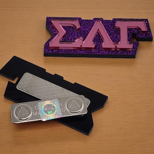 Sigma Lambda Gamma Pink Mirror on Purple Glitter Magnetic Pin, SLG-PIN Pendant, Pink Mirror on Purlple Badge  - 1094-EBF46A-050323