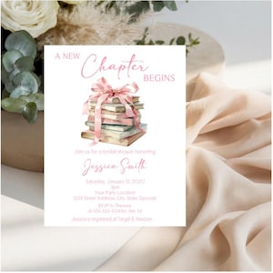 May include: A white bridal shower invitation card featuring a stack of books tied with a pink ribbon and the text A NEW CHAPTER BEGINS. The card includes details for Jessica Smith on Saturday, January 12, 2020, at 3pm, with RSVP and registry info.