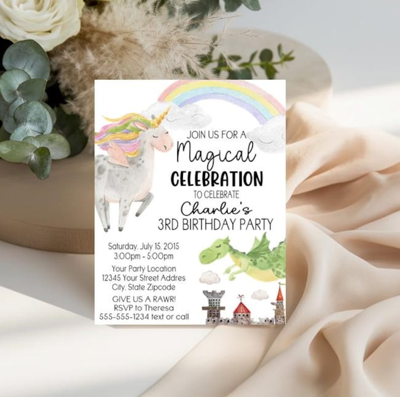 May include: A rectangular birthday party invitation card featuring a watercolor illustration of a unicorn with a rainbow, a green dragon, and a castle. The text reads: JOIN US FOR A Magical CELEBRATION TO CELEBRATE Charlie's 3RD BIRTHDAY PARTY.