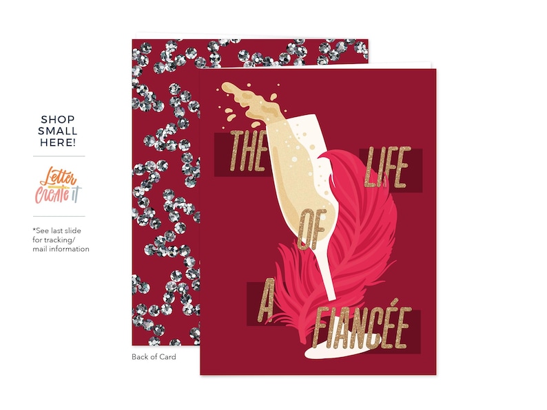 May include: A burgundy greeting card with a champagne glass and pink feather design. The text reads "THE LIFE OF A FIANC&Eacute;E" in gold lettering. The left side has a pattern of silver gems. The card is for a special occasion.