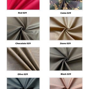 May include: Fabric swatches in various colors, including red, camo, chocolate brown, stone, olive, black, navy, and chestnut. Each swatch is folded in a spiral shape.