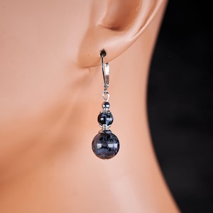 Genuine indigo Gabbro mystic merlinite earrings. Natural mystic merlenite indigo gabbro sterling silver earrings