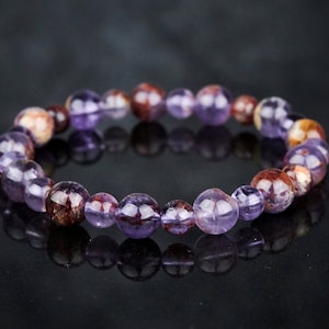 Genuine Auralite 23 super seven bracelet. Natural auralite 23 stretch bracelet