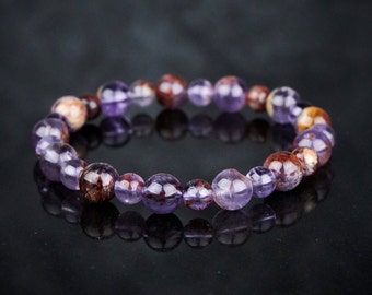 Genuine Auralite 23 super seven bracelet. Natural auralite 23 stretch bracelet