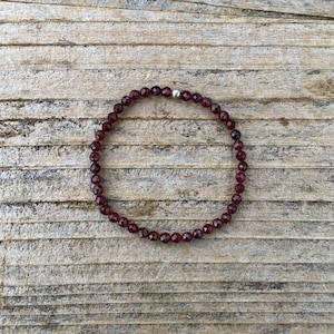 Almandine Garnet 4mm [grounding, strength, security, releasing fear, clearing karmic patterns, blood pressure]