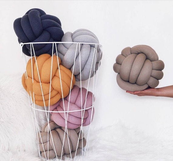 yellow knot pillow