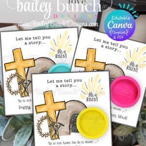 Puede incluir: Se muestran tres tarjetas con temática de Pascua con una cruz, una tumba y el texto "¡Ha resucitado!". Las tarjetas están acompañadas de recipientes circulares de colores. El texto "Déjame contarte una historia..." aparece en las tarjetas. Se ve el sitio web www.baileybunchdesigns.com.