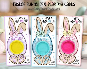 May include: Three printable Easter bunny Play-Doh cards with a bunny holding an egg with a circle cut out for Play-Doh. The cards have the text "Have a Won-Doh-Ful Easter!" and "Your Friend Madison".