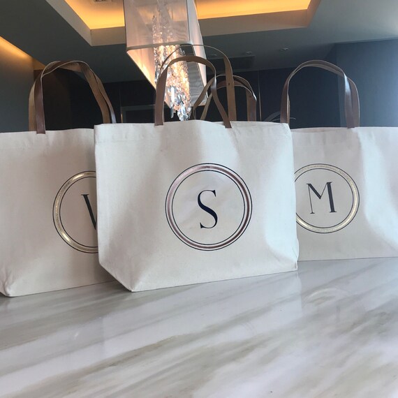 navy and rose gold bag