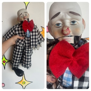 Bambola da clown del circo hobo triste vintage in porcellana, carina e raccapricciante