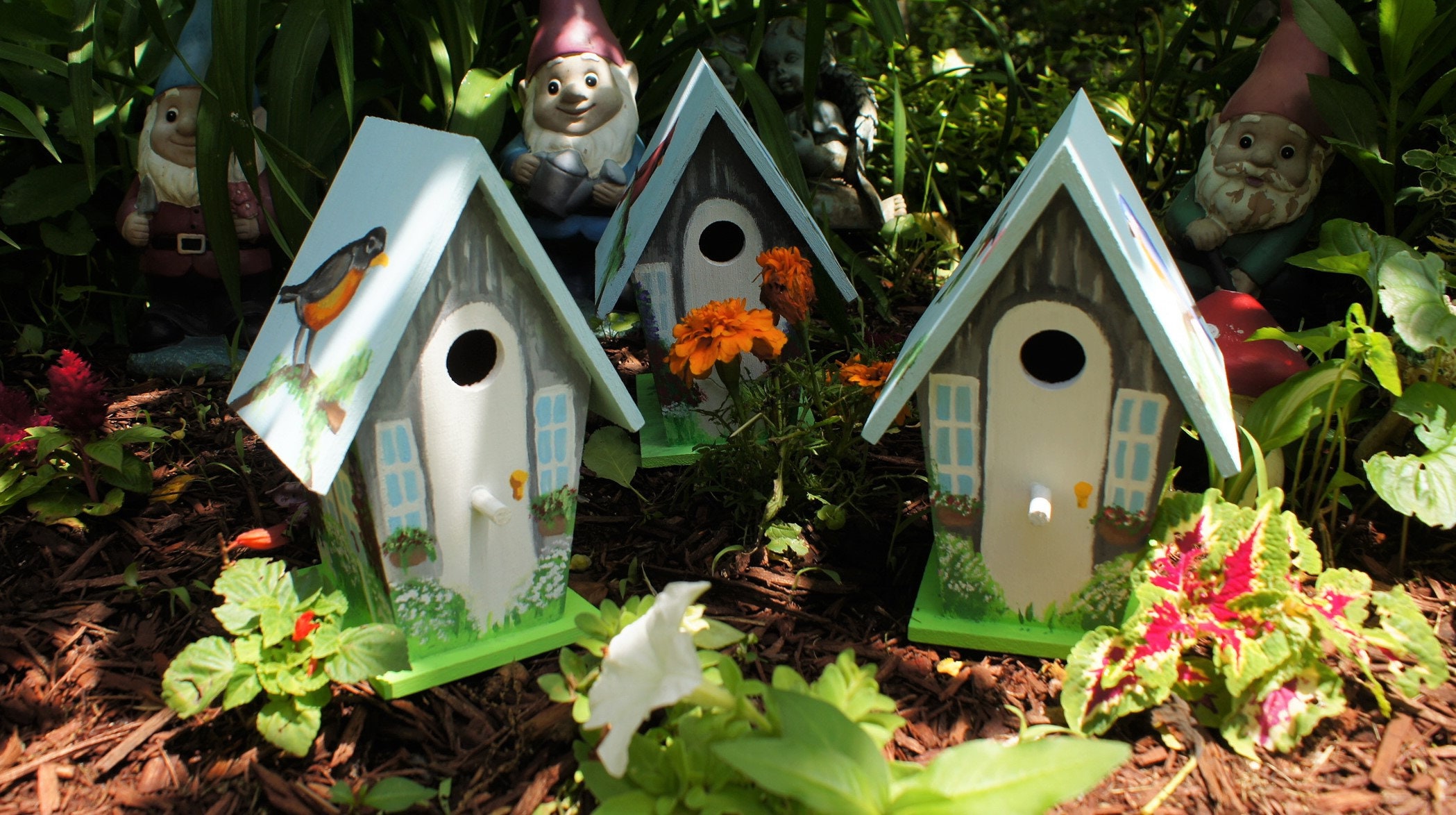 Hand-painted birdhouses