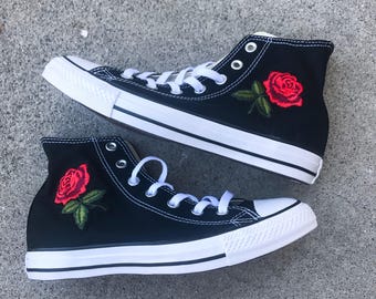 black converse with red roses 
