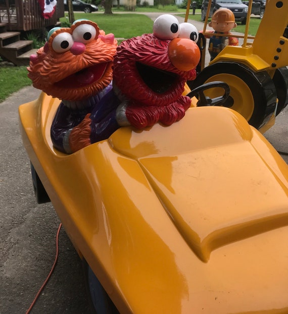 elmo ride on car