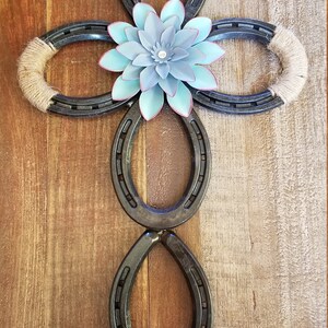 Horseshoe floral cross