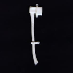 May include: White plastic toy axe with a curved handle.
