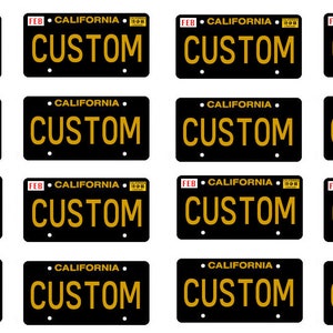 May include: A sheet of 16 black and gold California license plates with the word "CUSTOM" printed in gold letters. The plates are arranged in a 4x4 grid.