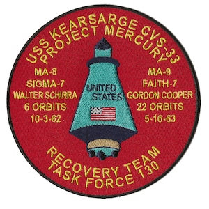 May include: A red, white, and blue embroidered patch with the text "USS KEARSARGE CVS-33 PROJECT MERCURY" in yellow. The patch features a blue and green rocket with the text "UNITED STATES" and a small American flag. The text "MA-8 SIGMA-7 WALTER SCHIRRA 6 ORBITS 10-3-62" and "MA-9 FAITH-7 GORDON COOPER 22 ORBITS 5-16-63" are also included. The bottom of the patch reads "RECOVERY TEAM TASK FORCE 130".
