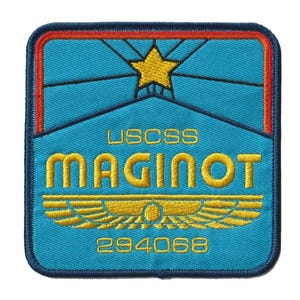 May include: A square patch with a blue background, a gold star, and the text "USCSS MAGINOT" in gold. The patch has a red border and a gold wing design. The number "294068" is at the bottom.