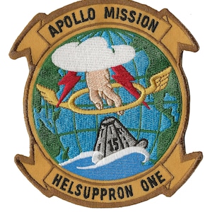May include: A brown and gold embroidered patch with a globe, a hand reaching down from a cloud, and the text "APOLLO MISSION HELSUPRON ONE".