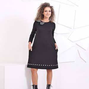 Schwarzes Maxikleid mit Taschen: Langarm-formales Oversize-Kleid